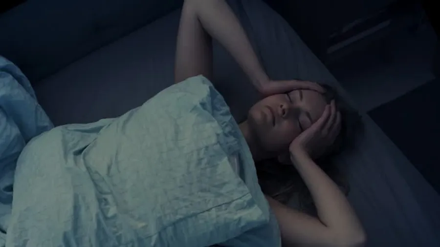 Personne dormant paisiblement, représentant le sommeil